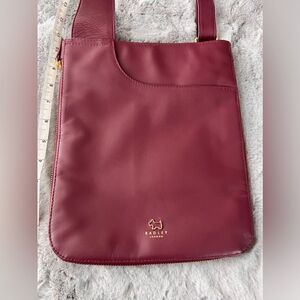 EUC Radley London medium zip around crossbody bag dark burgundy